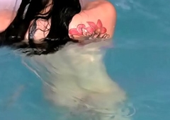 Big ass wireless plays near her massive penis in pool and cums